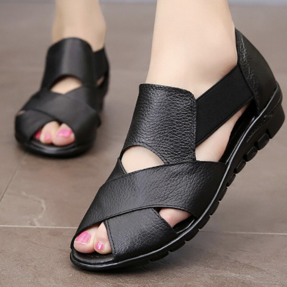 Sandali con zeppa in pelle da donna