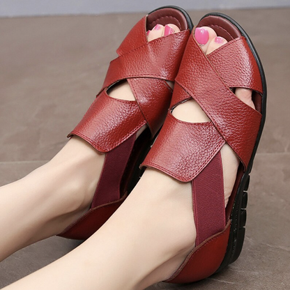 Sandali con zeppa in pelle da donna