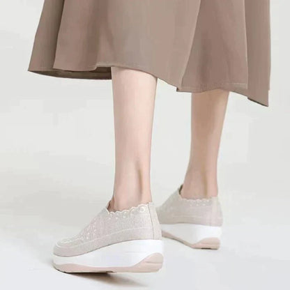 Scarpe da ginnastica con poggiapiedi per donne