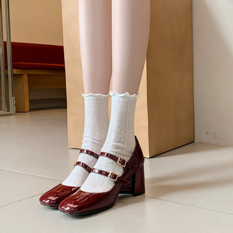 Décolleté in pelle con doppio cinturino