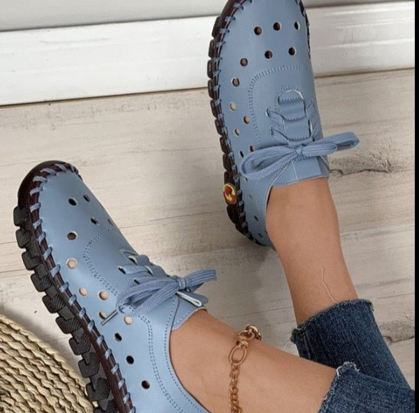 Scarpe piatte in pelle morbida da donna