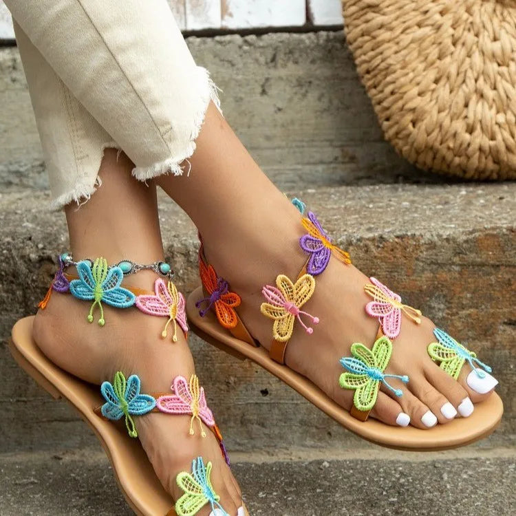 Sandali piatti da donna con farfalle colorate