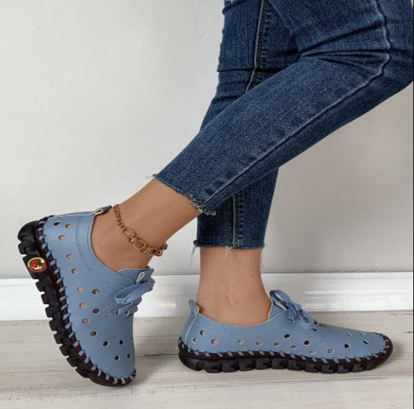 Scarpe piatte in pelle morbida da donna