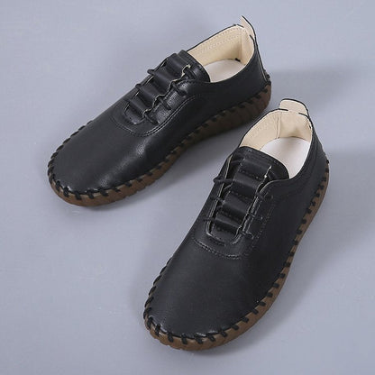 Scarpe piatte in pelle morbida da donna