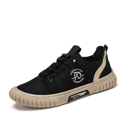 Le scarpe di tela respirano le scarpe da ginnastica da uomo