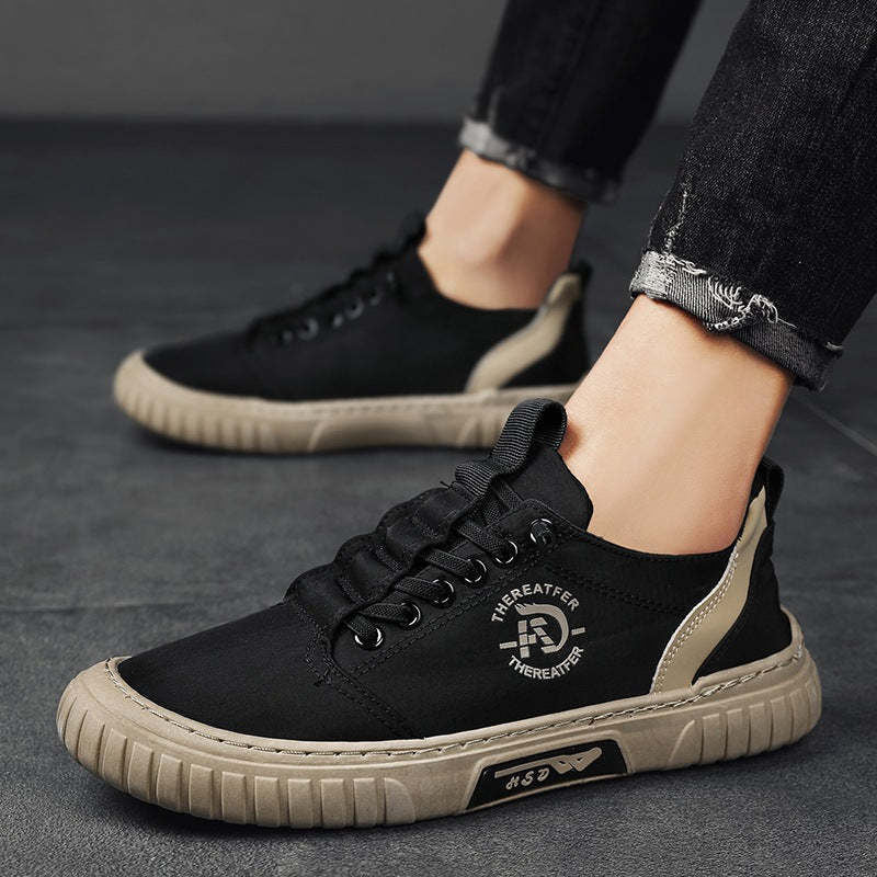 Le scarpe di tela respirano le scarpe da ginnastica da uomo